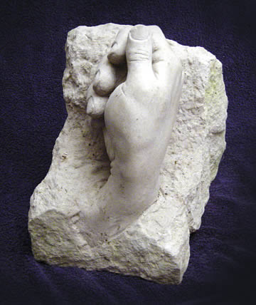 Hand in Clunch stone